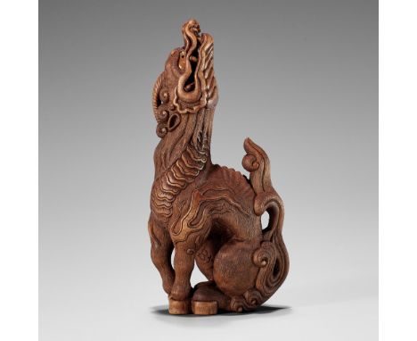 VADYM PYVOVAR: A WOOD NETSUKE OF A KIRIN AFTER SANKOBy Vadym Pyvovar, signed with the artist's initialsUkraine, 2023Finely ca