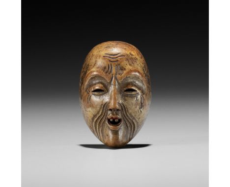 A LACQUERED WOOD MASK NETSUKE OF KOJOUnsigned Japan, 19th centuryExpressively carved, the old man with an almost ghost-like a