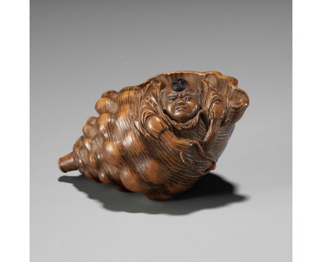 JUGYOKU: A FINE INLAID WOOD NETSUKE OF BENKEI INSIDE HORAGAI  By Ryukosai Jugyoku, signed Jugyoku 壽玉Japan, Edo (Tokyo), first