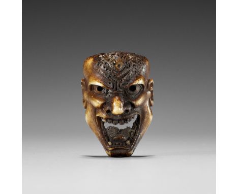 A SUPERB STAG ANTLER MASK NETSUKE OF HANNYAUnsigned Japan, probably Asakusa, Toyko, second half of 19th centuryFinely carved 