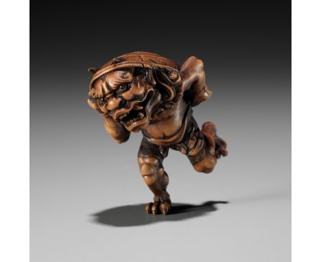 A WOOD NETSUKE OF AN ONI AT SETSUBUN, ATTRIBUTED TO ROKKOAttributed to Rokko, unsignedJapan, Tokyo, late 19th century Finely 