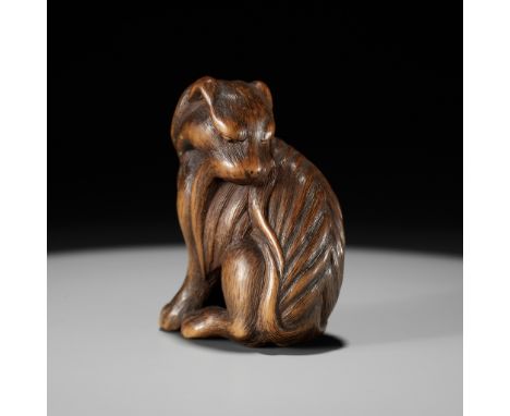 TADAKUNI: A SUPERB AND RARE WOOD NETSUKE OF A JAKONEKO (MUSK CAT)By Tadakuni, signed Tadakuni 忠國Japan, Nagoya, mid-19th centu