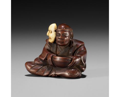 RYUSEI: A FINE WOOD NETSUKE OF AN ACTOR WITH A BUAKU MASKBy Ryusei, signed Ryusei 龍生Japan, Edo (Tokyo), mid-19th century, Edo