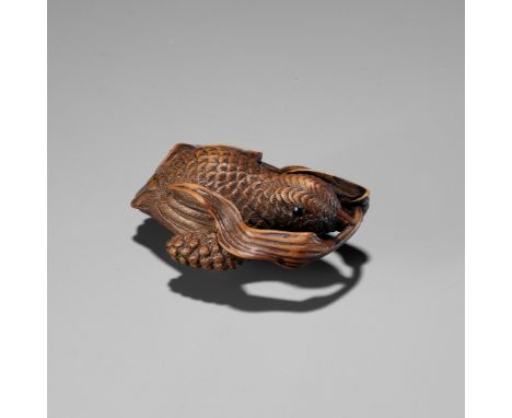 A FINE TANBA SCHOOL WOOD NETSUKE OF A QUAIL AND MILLETUnsigned Japan, Tanba Province, 19th century, Edo period (1615-1868)Fin
