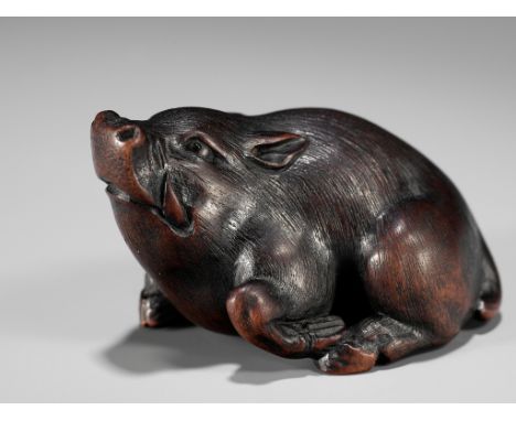 ITTAN: A SUPERB WOOD NETSUKE OF A WILD BOARBy Ittan, signed Ittan 一旦 with kakihan Japan, Nagoya, c. 1850, Edo period (1615-18
