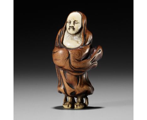 SHOUNSAI: AN EXCELLENT AND RARE WOOD AND IVORY NETSUKE OF DARUMABy Shounsai Joryu, signed Shounsai 升雲齋Japan, Edo (Tokyo), ear