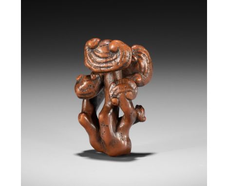 ZESHIN: A WOOD NETSUKE OF A REISHI FUNGUS WITH LACQUERED ANTSBy Shibata Zeshin (1807-1891), signed Zeshin 是眞Japan, Tokyo, lat