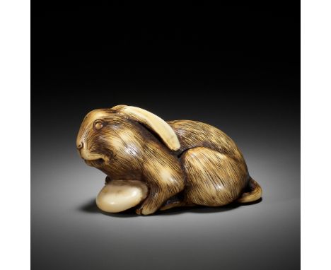 MASATOMO: A RARE IVORY NETSUKE OF A HARE WITH MUSHROOMBy Masatomo, signed Masatomo 正友 Japan, Kyoto, c. 1800, Edo period (1615