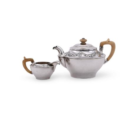 
	
		Y&nbsp;AN AUSTRIAN SILVER CIRCULAR TEA POT AND CREAM JUG
		JOSEPH CARL KLINKOSCH, VIENNA, 1872 - 1922 .800 STANDARD
		Wi