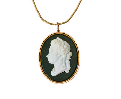
	
		GEORGE III AND QUEEN CHARLOTTE, A PASTE AND BLOODSTONE COMMEMORATIVE PENDANT
		CIRCA 1770 
		With polished bloodstone gr