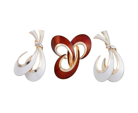 
	
		HANS MYHRE, A COLLECTION OF THREE VINTAGE ENAMELLED BROOCHES
		Comprising a red guilloché enamelled hooped crescent broo