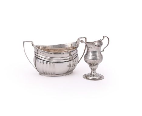 
	
		A GEORGE III SILVER OVAL TWIN HANDLED SUGAR BOWL
		MAKER'S MARK S.D OVERSTRIKING THAT OF ANOTHER, LONDON 1804
		The half