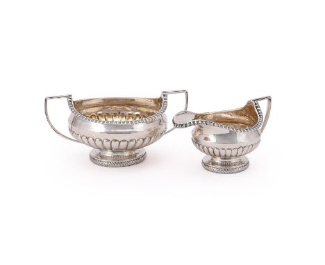 
	
		A GEORGE III SILVER SUGAR BOWL AND CREAM JUG
		ROBERT GRAY &amp; SON, EDINBURGH 1815
		The sugar bowl with twin harp han