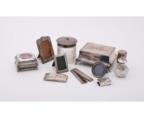 
	
		Y&nbsp;A COLLECTION OF SILVER DRESSING TABLE ITEMS
		To include: a rectangular silver mounted jewellery box by Joseph Gl