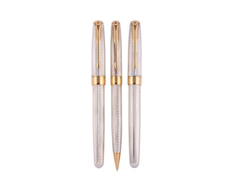 
	
		PARKER, SONNET 
		A SILVER COLOURED FOUNTAIN PEN, PENCIL AND ROLLER BALL PEN
		Cap and Barrel: With silver coloured chev