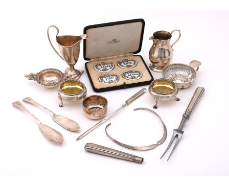 
	
		A COLLECTION OF SILVER ITEMS
		To include: a baluster cream jug, maker's mark RAM, London 1923, with a scroll handle and