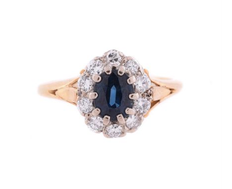 
	
		A SAPPHIRE AND DIAMOND CLUSTER RING
		The central oval cut sapphire within a surround of brilliant cut diamonds, approxi