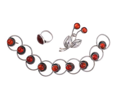 
	
		NIELS ERIK FROM, A SMALL COLLECTION OF AMBER AND SILVER COLOURED JEWELLERY
		Comprising an amber and silver circular lin