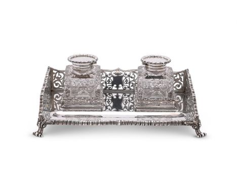 
	
		A SILVER RECTANGULAR INKSTAND 
		GOLDSMITHS &amp; SILVERSMITHS CO. LTD., LONDON 1915
		With a gadrooned border, pierced 