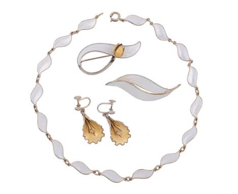 
	
		AKSEL HOLMSEN, A COLLECTION OF VINTAGE ENAMELLED JEWELLERY
		Comprising a white enamelled leaf necklace, the panels stam