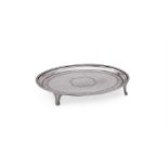 A GEORGE III SILVER OVAL TEAPOT STAND