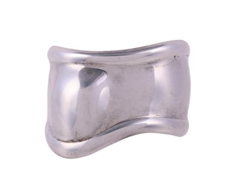 
	
		TIFFANY &amp; CO., ELSA PERETTI, BONE, A SILVER CUFF BANGLE
		The polished shaped silver cuff signed Tiffany &amp; Co. E