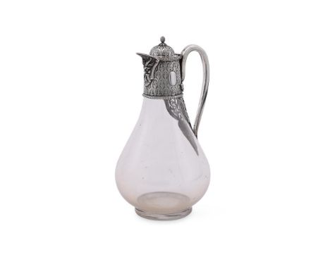 
	
		A VICTORIAN SILVER MOUNTED CLARET JUG
		MAKER'S MARK C.F, SHEFFIELD 1875
		With a bud finial to the domed cover, a scrol