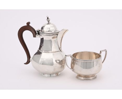 
	
		A SILVER LOBED BALUSTER COFFEE POT
		ASPREY &amp; CO. LTD., CHESTER 1930
		With an octagonal finial to the domed cover, 