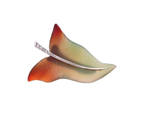 
	
		A CARVED HARDSTONE AND DIAMOND LEAF BROOCH
		The matt textured tapered brown and green hardstone leaf, the stalk set wit
