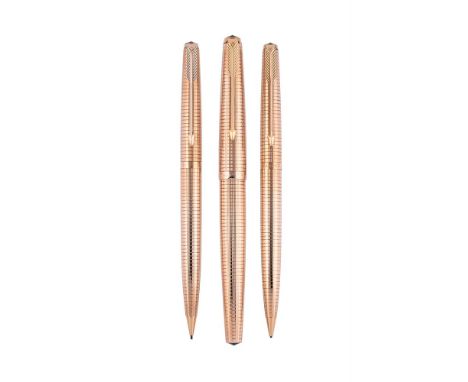 
	
		PARKER, 61, CONSORT 
		A FOUNTAIN PEN AND TWO PENCILS
		Cap and Barrel: With gilt lattice engraved caps and barrels, arr