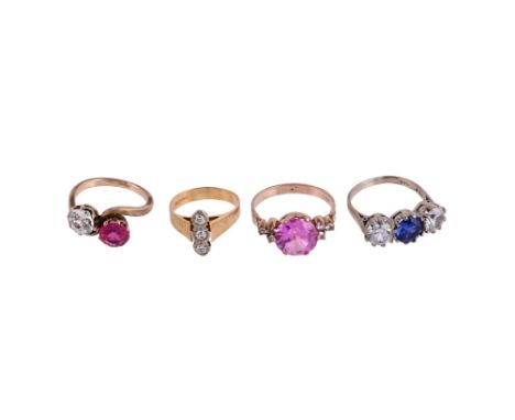 
	
		FOUR GOLD COLOURED DRESS RINGS
		The first ring with a trio of old cut diamonds in illusion settings, set in a horizonta