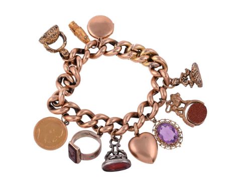 
	
		A VINTAGE CHARM BRACELET
		The hollow curb links suspending various charms, including an Edward VII 1905 sovereign; a la