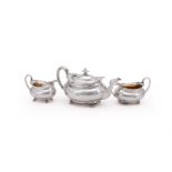 Y A SILVER THREE PIECE OVAL BALUSTER TEA SET