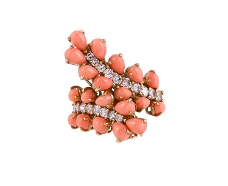 
	
		Y&nbsp;A CORAL AND DIAMOND CROSSOVER DRESS RING
		The crossover feather like panels with a central row of graduated bril