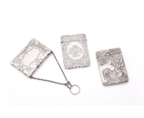 
	
		THREE SILVER CARD CASES
		To include: a Victorian shaped rectangular card case by Hilliard &amp; Thomason, Birmingham 18