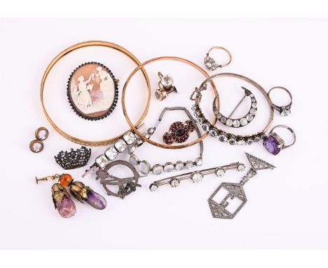 
	
		A COLLECTION OF SILVER COLOURED ANTIQUE AND LATER COSTUME JEWELLERY
		Including an early 20th century white paste hinged