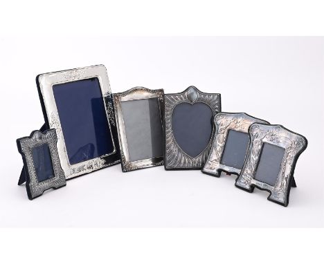 
	
		A COLLECTION OF SILVER MOUNTED PHOTO FRAMES
		To include: a pair of frames by Keyford Frames Ltd., London 1981, embossed