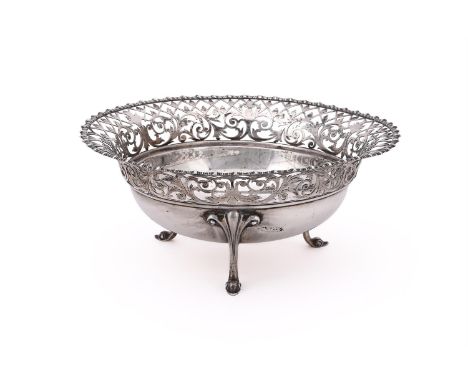 
	
		AN EDWARDIAN SILVER CIRCULAR BOWL
		JAMES DIXON &amp; SONS LTD., SHEFFIELD 1906
		With a gadrooned border, pierced with 