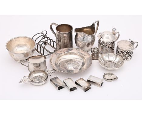
	
		A COLLECTION OF SILVER ITEMS
		To include: a pierced cylindrical mustard pot by S. J. Phillips Ltd., London 1924, with a