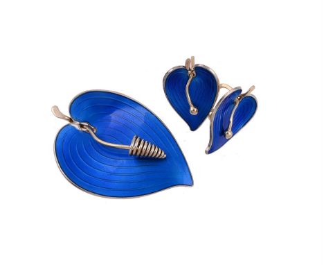 
	
		EINAR MODAHL, A COLLECTION OF VINTAGE BLUE ENAMELLED JEWELLERY 
		The blue enameled brooch and earrings in the form of c