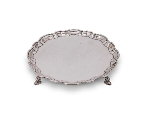 
	
		A SILVER SHAPED CIRCULAR SALVER
		MAPPIN &amp; WEBB, SHEFFIELD 1969
		With a raised moulded border and on four shell and