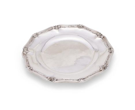 
	
		A FRENCH SILVER COLOURED SHAPED CIRCULAR SERVING DISH
		MAKER'S MARK OBSCURED, MINERVA MARK
		With a chased foliate and 