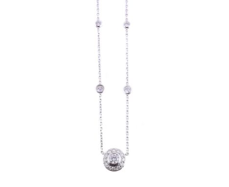 
	
		A DIAMOND CLUSTER PENDANT
		The brilliant cut diamond cluster suspended from a belcher link chain with spectacle set bri