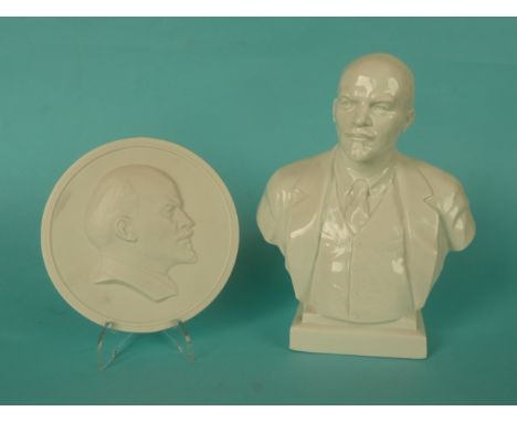 Lenin: a white glazed Russian porcelain portrait bust after Vybogolyubov, 185mm and a circular white bisque porcelain portrai