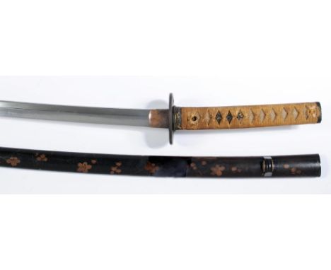 A JAPANESE BIZEN KATANA, late 17th/18thcentury, the 25 3/4" blade with strong undulating hamon and visible hada, unsigned tan