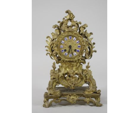 A FRENCH GILT METAL MANTEL CLOCK, late 19th century, the twin barrel movement striking on a bell, stamped Guiche Palais Royal