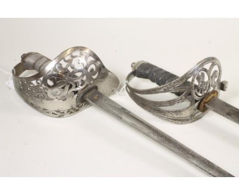 AN 1827 PATTERN OFFICER'S SWORD BY WILKINSON, PALL MALL, the 32 1/2" fullered blade bearing maker's mark, foliate scrolls, st