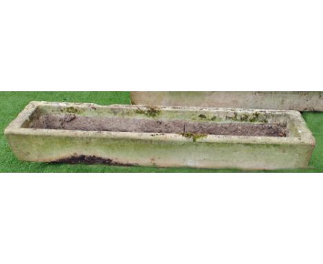 A SANDSTONE TROUGH, a near match to previous lot, 75" x 16" x 10 1/2" (Illustrated)