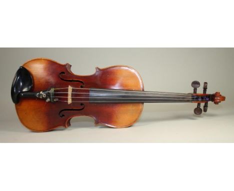 A GERMAN "MAGGINI" VIOLIN, c.1880, with 358mm two piece back, stamped "Paganini" below button, unlabelled, the ebony tail wit