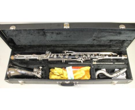 A SELMER BASS CLARINET, with silver plated horn and crook, 38 1/2" long overall, cased